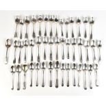 A group of late 18th and early 19th century hallmarked silver spoons of varied pattern and size, the