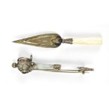 A Scottish white metal agate scarf pin in the form of a basket hilt sword, length 7cm, also a