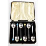 WILLIAM HAIR HASELER LTD; a cased set of six George V hallmarked silver Art Deco tea spoons with