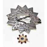 GEORGE UNITE; a white metal star brooch with bright cut detail, stamped and registration marks to