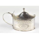 JOHN PRIESTMAN; a George III hallmarked silver mustard with bright cut detail and engraved