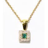 An 18ct yellow gold diamond and emerald squared pendant on 18ct yellow gold chain, length 40cm,