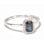 A 9ct white gold sapphire and diamond ring, size N, approx 1.4g. Additional InformationThe