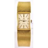 OMEGA; a 1969 gentleman's 18ct yellow gold De Ville wristwatch, with rectangular silvered dial and