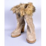 PRADA; a pair of faux fur and sheepskin boots, heel 3.5 inches (size 5).