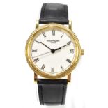 PATEK PHILIPPE; a gentleman’s 18ct gold Calatrava automatic wristwatch, the circular enamel dial