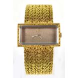 OMEGA; a 1970s lady's 18ct gold De Ville wristwatch, the rectangular dial with quarter batons,