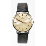 OMEGA; a gentleman's vintage stainless steel wristwatch with baton hour markers, silvered dial and