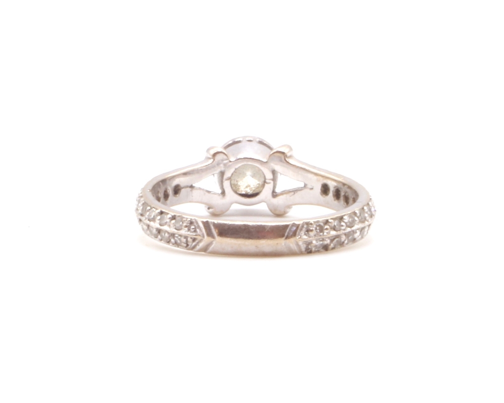 A modern 18ct white gold diamond solitaire ring, the principal collet set stone weighing approx 0. - Image 3 of 4