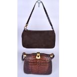 SALVATORE FERRAGAMO; a brown suede leather shoulder bag with gold tone hardware (with dust bag),