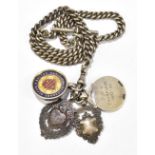 A hallmarked silver Albert Chain and T-bar with four attached hallmarked silver fobs/medals, one