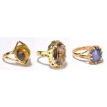 A 9ct yellow gold opal set dress ring, size M, and two yellow metal dress rings, combined approx
