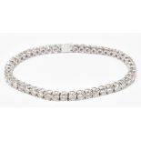 An 18ct white gold diamond tennis bracelet set with forty eight round brilliant cut stones totalling