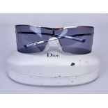 DIOR; a pair of lady’s wraparound sunglasses with original case.