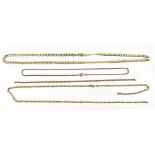 A 9ct yellow gold flat link chain, length 61cm, a further chain (af) and two yellow metal chains,