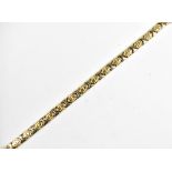 A yellow and white metal two tone bracelet, stamped 585 Italy, length 20cm, approx 13.1g.