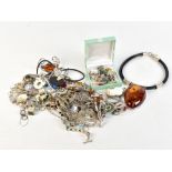 A group of silver, 925 stamped and unmarked white metal jewellery including a large Baltic amber