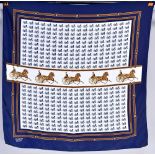 A 100% silk scarf with chariot logo motif, boxed.