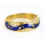 FABERGÉ; a contemporary 18ct yellow gold blue enamelled and diamond ring numbered 207/300 and sold