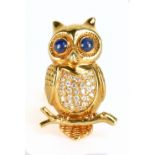 An 18ct yellow gold Athenian owl brooch in the manner of Boucheron set with cabochon sapphires for