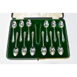 WALKER & HALL; a cased set of twelve George V hallmarked silver teaspoons and pair of sugar tongs,