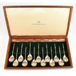 BIRMINGHAM MINT CO; a cased set of thirteen Elizabeth II hallmarked silver apostle spoons,