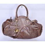 VIVIENNE WESTWOOD; a brown soft leather handbag with large gold tone maker's logo VW bag charm, 50 x