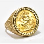 An Elizabeth II full sovereign, 1966, set in a 9ct yellow gold ring with floral detail to shoulders,