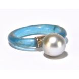 HEINZ GELLNER FOR BOODLES; a Tahitian pearl, coloured plastic and silver mounted ring, size approx