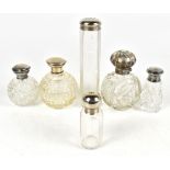 Four variously hallmarked silver topped clear glass vanity jars and two silver plated examples (6).