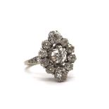 A white gold diamond set ring, the three principal brilliant cut stones each weighing approx 0.75cts