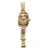 ZENITH; a lady's 9ct yellow gold vintage wristwatch with circular silver dial inscribed 'Irvine