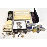 A quantity of costume jewellery including simulated pearls, Scottish inspired brooches, silver