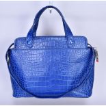 LULU GUINNESS; a blue leather croc embossed handbag with silver tone metal and red lipstick zip