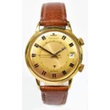 JAEGER LE COULTRE;  a 1970s gentleman’s 18ct gold automatic Memovox alarm wristwatch the part