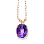 An oval amethyst pendant in yellow metal frame suspended on a yellow metal fine link chain, the