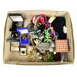 A quantity of costume jewellery including beaded necklaces, costume brooches, faux pearl drop