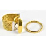 A 9ct yellow gold wedding band, approximate size R, and an unusual 9ct textured gold cufflink with