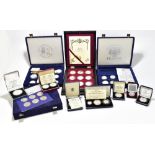 A group of silver coins including Queen Elizabeth II 40th Anniversary Coronation Collection (