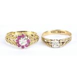 Two 9ct yellow gold floral dress rings with pierced shoulders, sizes N and O1/2, combined 4.35g (