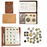 A quantity of British and world coins in two albums,