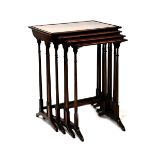 An Edwardian cross-banded quartetto of occasional tables,