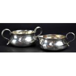 A George V hallmarked silver creamer and sucrier, George Edwards & Sons (David & George Edwards),