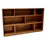 A mid-20th century mahogany floorstanding bookcase of three divided shelves on a plinth base, 91.