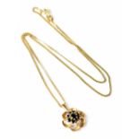 A nine-stone sapphire flower cluster necklace pendant in hallmarked 9ct gold mount on 9ct gold thin