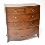 A Regency cross-banded mahogany bow-fronted chest of drawers,