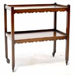 A mid-20th century mahogany two-tiered tea trolley,