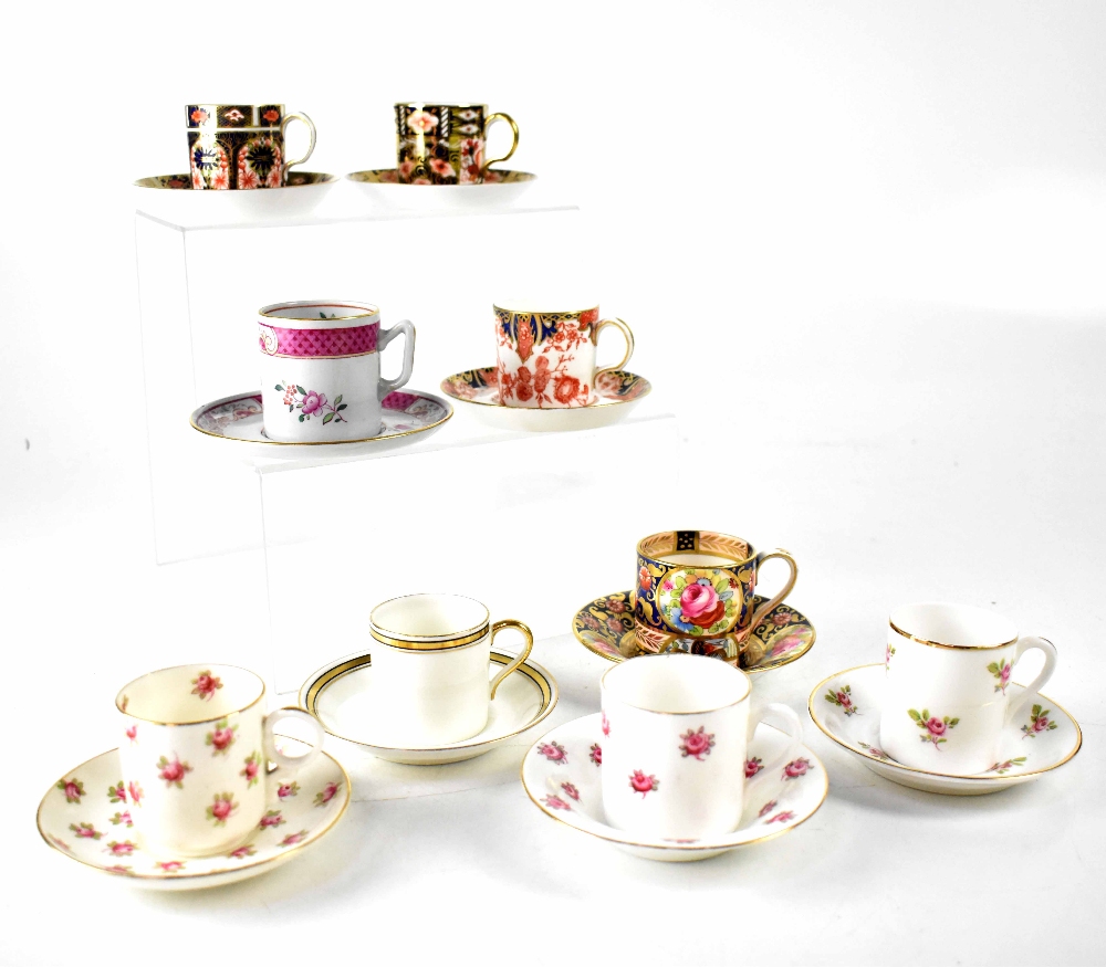 Collection of nine coffee cans and saucers to include,