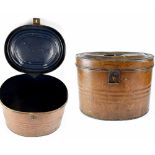 A 19th century metal top hat carrying case.
