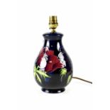 A Moorcroft table lamp of baluster form, cobalt blue ground with anemone pattern,